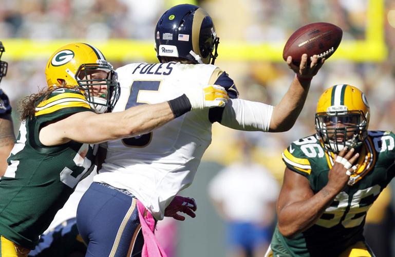 Pressure defense sends Packers to 50 Archives