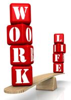 Work-life Balance. The Words Work And Life (made From Red Cubes With Letters) Are Weighed In The Bal