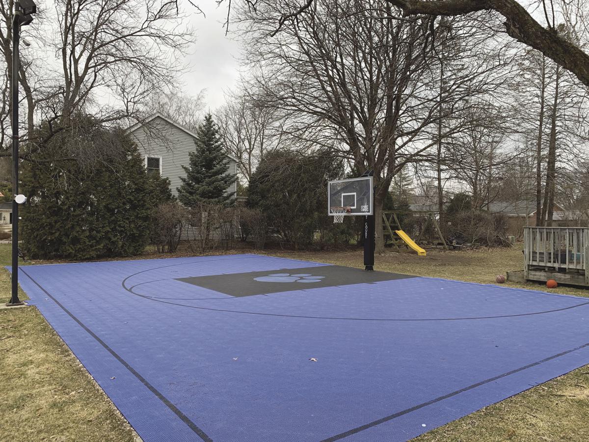Backyard Court Serving As Neighborhood Gathering Spot For Second