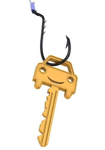Car As The Bait. Gold Key With Symbol Of Car As A Bait On Fishing Hook. The Concept Of Fraud When Bu