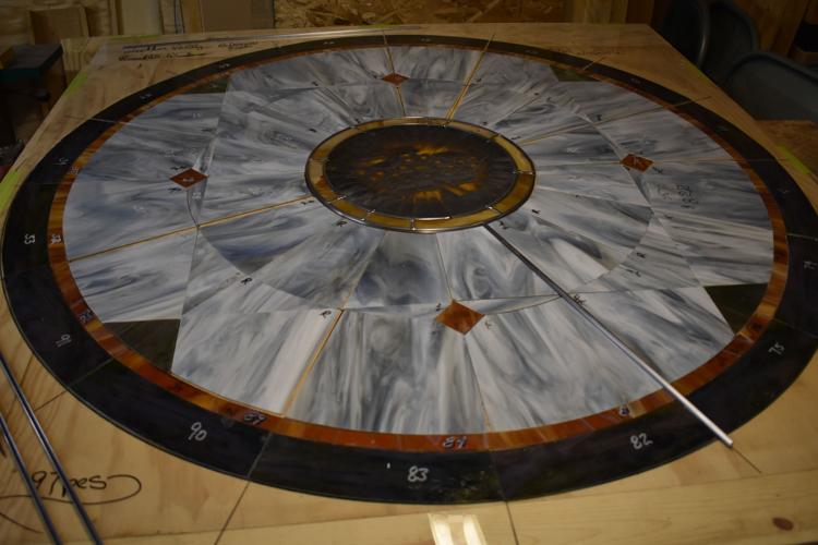 Stained glass artist restores historical window Local News