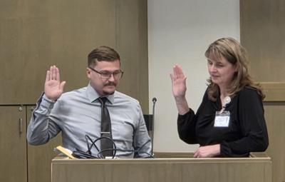 Brent Waters takes the oath of office