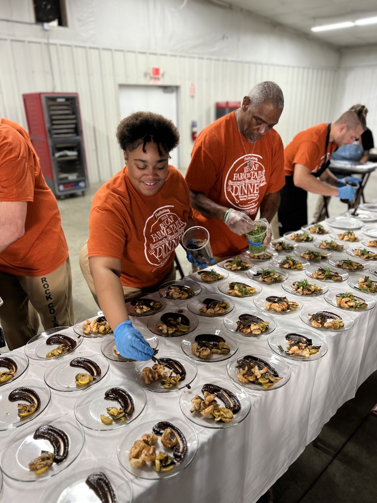Inmates plating food