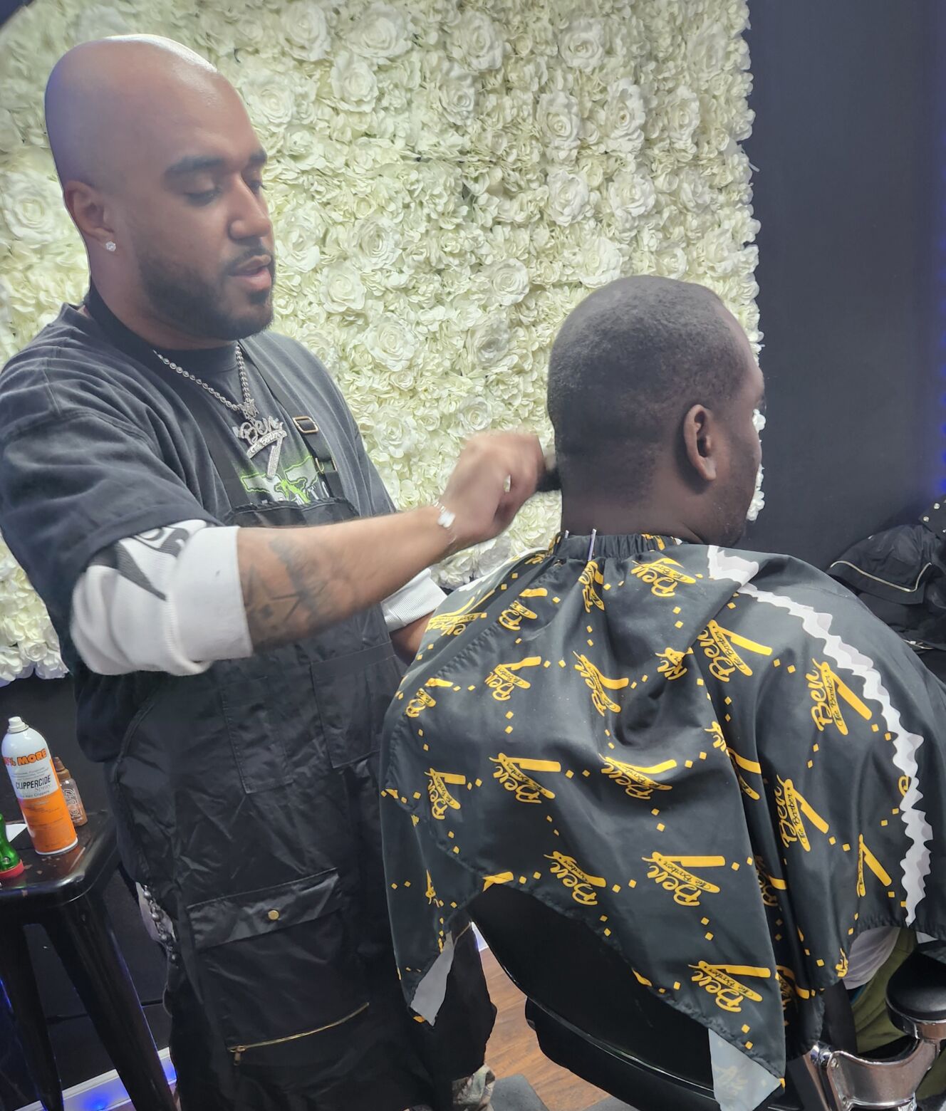 You got to hustle.' From $5 cuts in the Fourth Ward, barber now