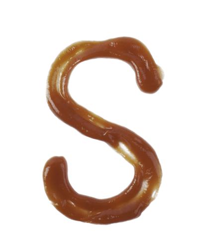 Single Latin Letter S Made Of Smeared Food Sauce Isolated Over The White Background