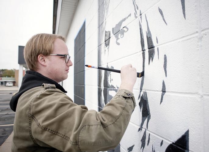 Janesville record store revives its rock star murals Archives