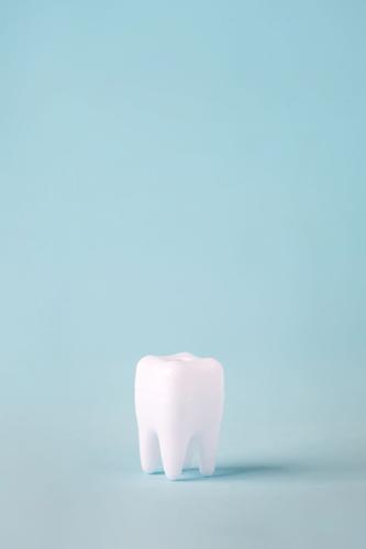 Dental Care Concept, Healthy Tooth Model On Blue Background With Copy Space. Minimal Dentistry, Oral