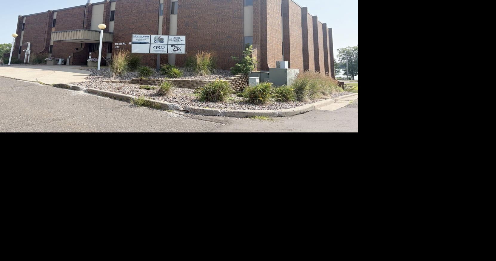 City to acquire 7 condominium units in Medical Arts Building plus parking lot