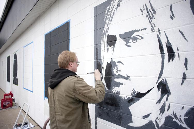 Janesville record store revives its rock star murals Archives