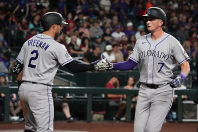 Rockies 1B TJ Rumfield leaves game with right hand contusion after hit by  pitch | National | gazettextra.com