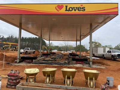 Love’s holds concrete  pouring ceremony