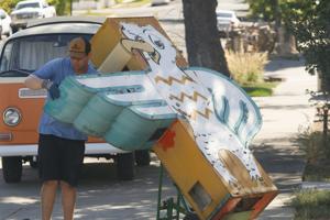 Three more vintage signs go up at Frontier Auto Museum