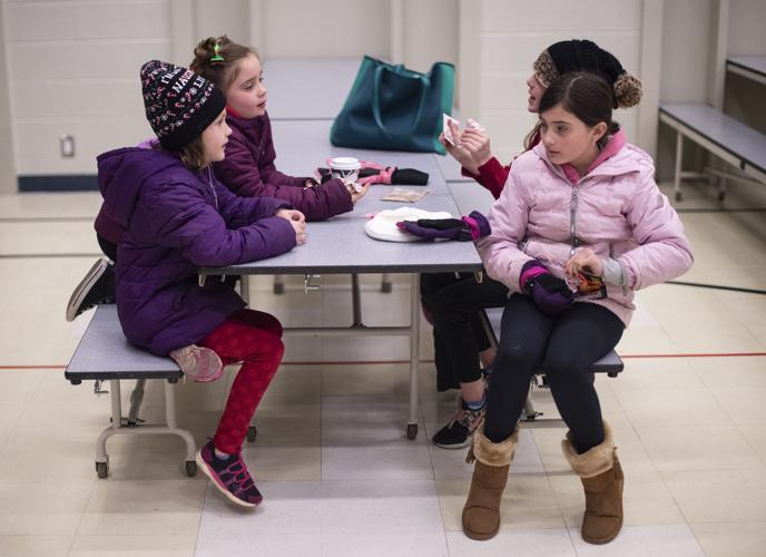 Paintbrush students take on neighborhood with carols Local News