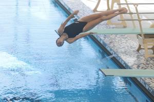 Girls swimmers compete against Laramie in first home meet at new Aquatic Center