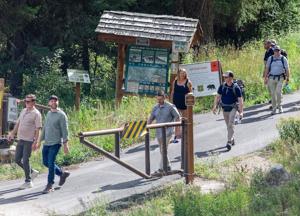 J.D. Vance and son hike scenic Forest Service trail in Jackson Hole