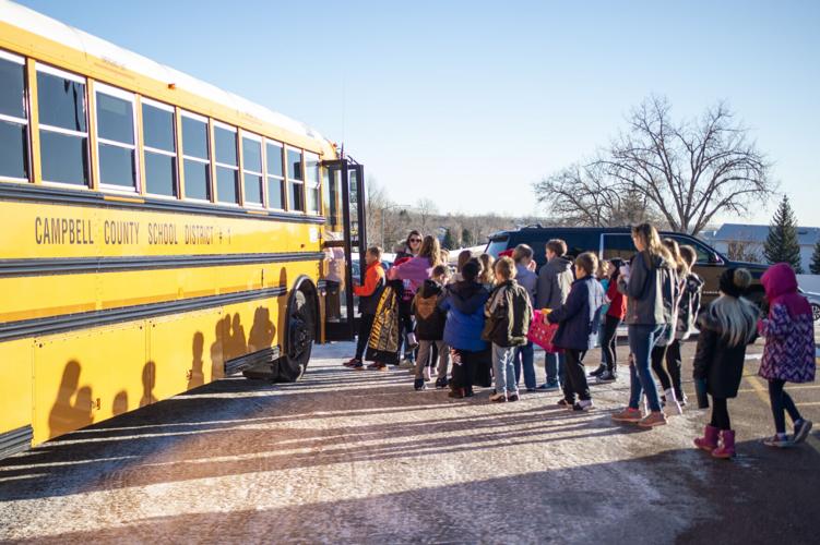 Paintbrush Christmas carolers enjoy a day on the town Local News