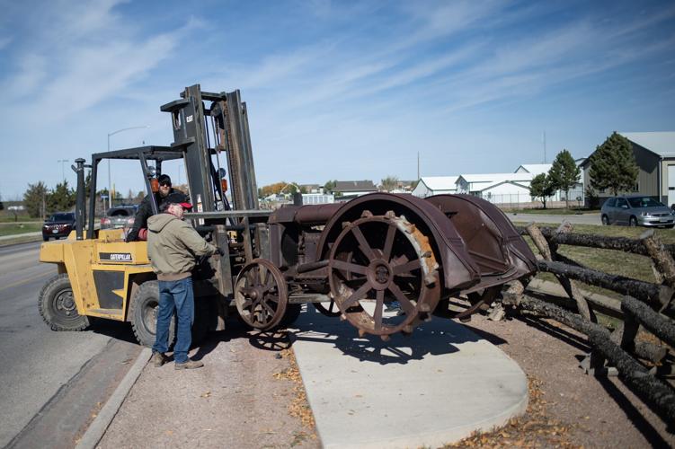 The return of "Big Red" Tractor installed along Gurley Avenue for