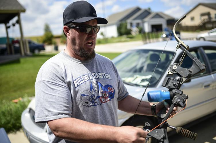 ‘Hunting on water’ Small but growing bowfishing community hunts waters