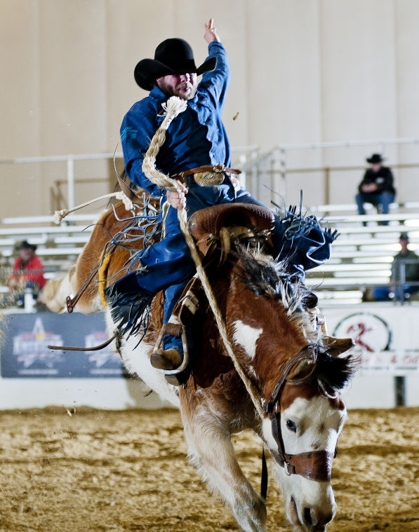 Hooper Wolford ride to qualifier victories Rodeo