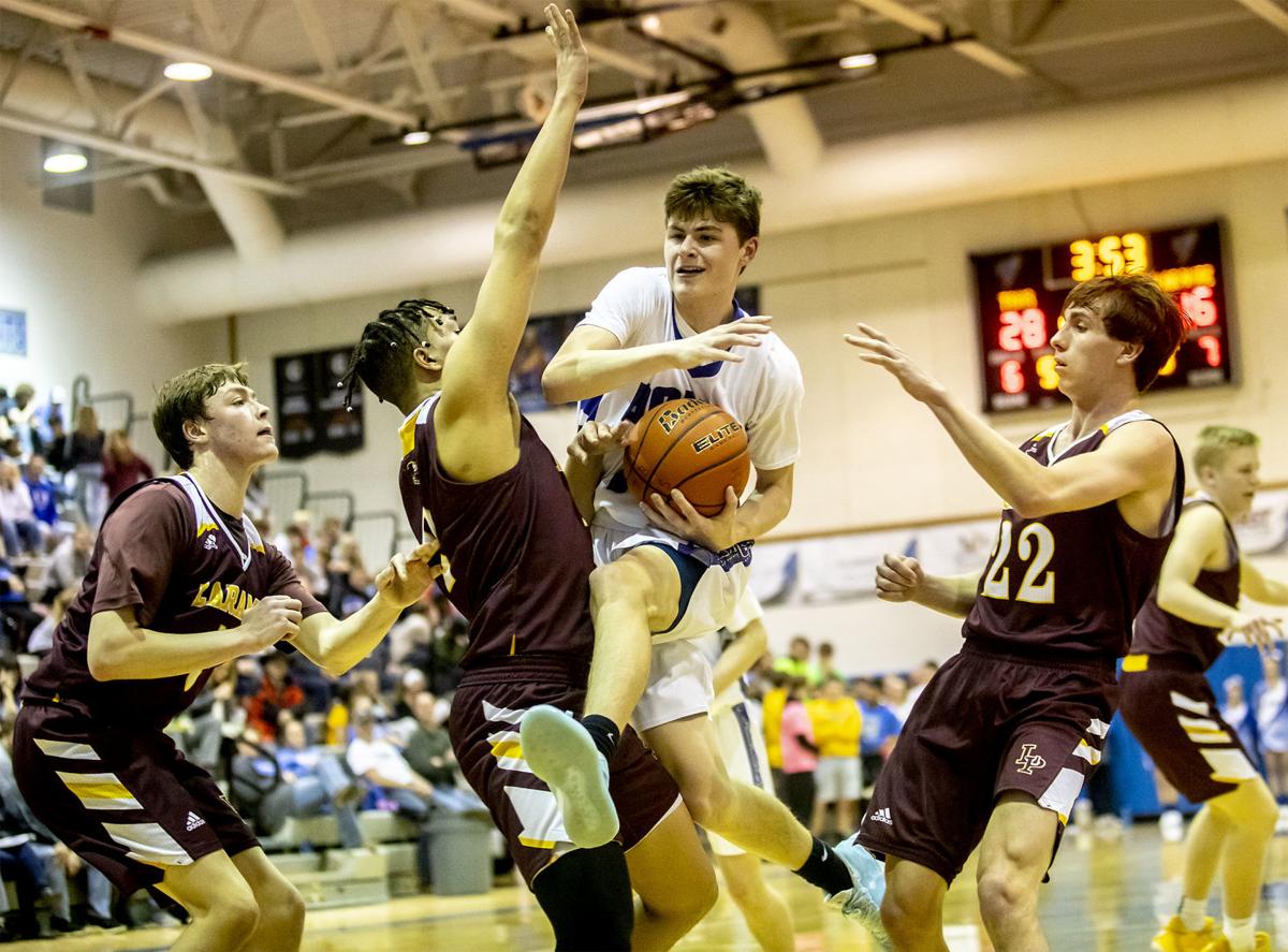 Tbhs Boys Basketball Beats Laramie 70 50 Advance To Regional
