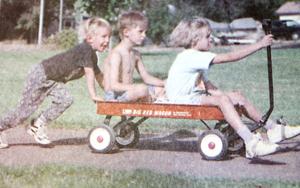 Histories: Children use wagon, and teamwork, to get to Lasting Legacy Park in 1997
