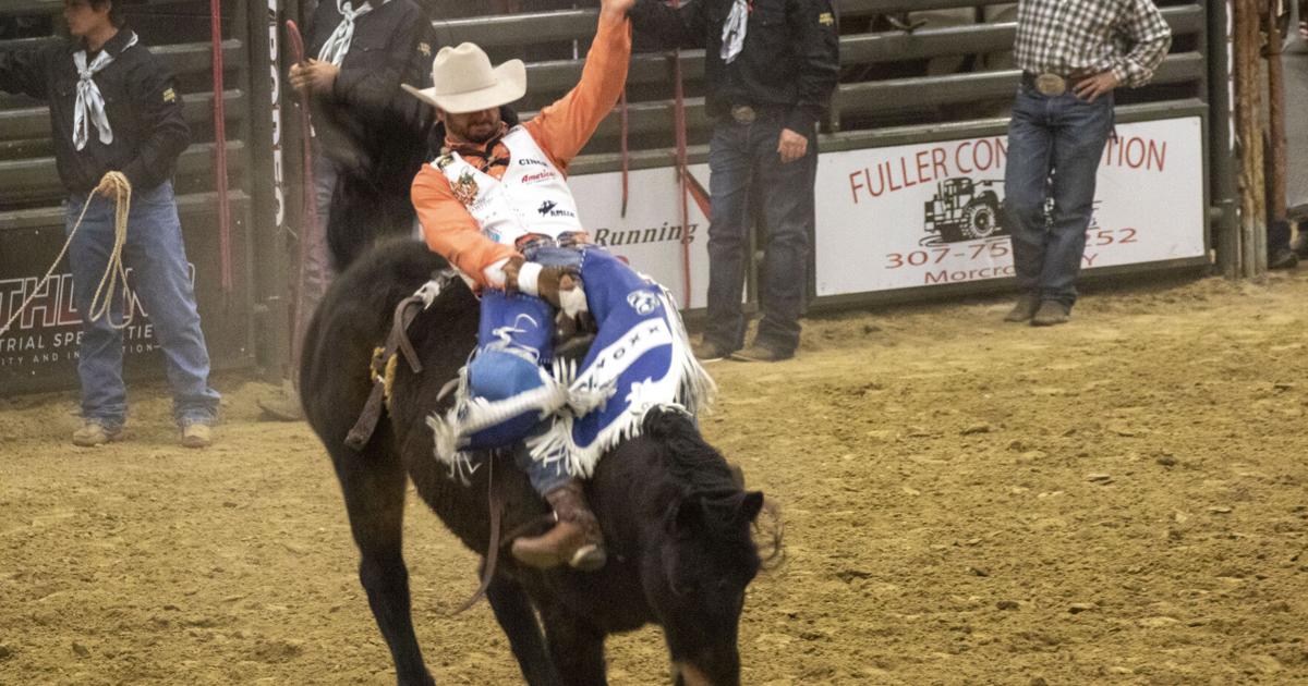 Rodeo athletes give packed room a show at New Year's Eve Buck and Ball ...