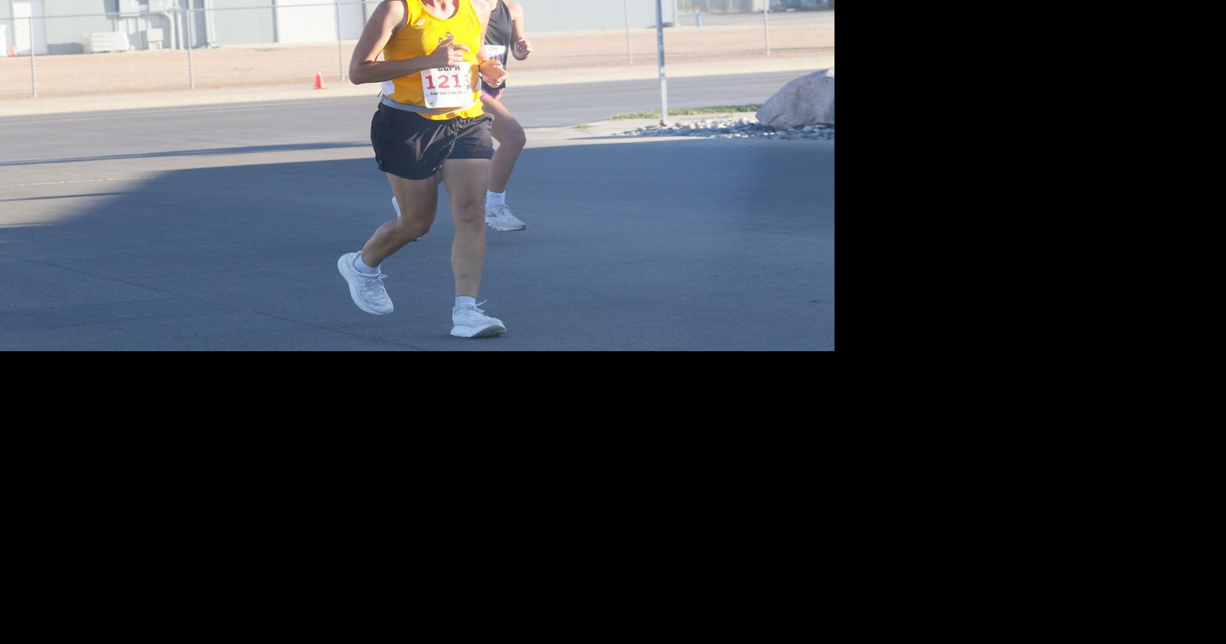 Nearly 100 people braved nearly 100-degree temperatures to finish Universal Athletics 5K