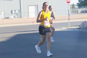 Nearly 100 people braved nearly 100-degree temperatures to finish Universal Athletics 5K
