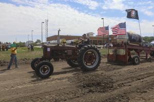 Locals put the pedal to the metal at annual antique tractor pull