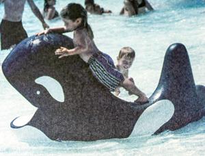 Histories: 2-year-old boy relaxes on famous whale at the City Pool in 1997
