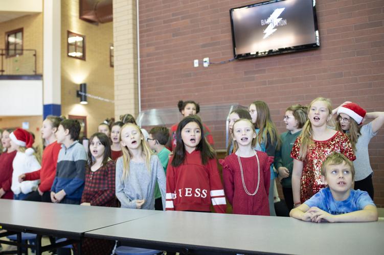 Paintbrush Christmas carolers enjoy a day on the town Local News