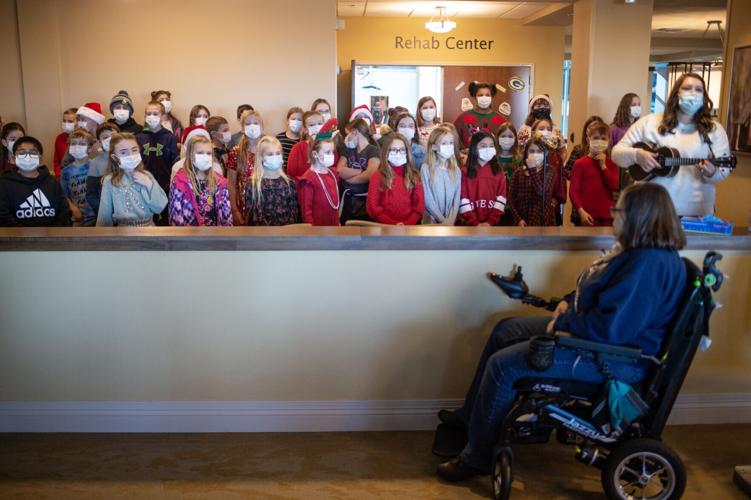 Paintbrush Christmas carolers enjoy a day on the town Local News