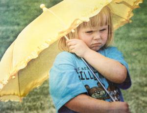 Histories: Girl tries to beat the heat at state softball tournament in 1997