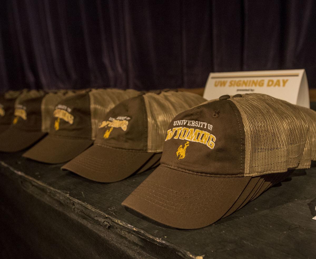 Brown And Gold Cookies Hats And Balloons Mark Uw Signing Day In