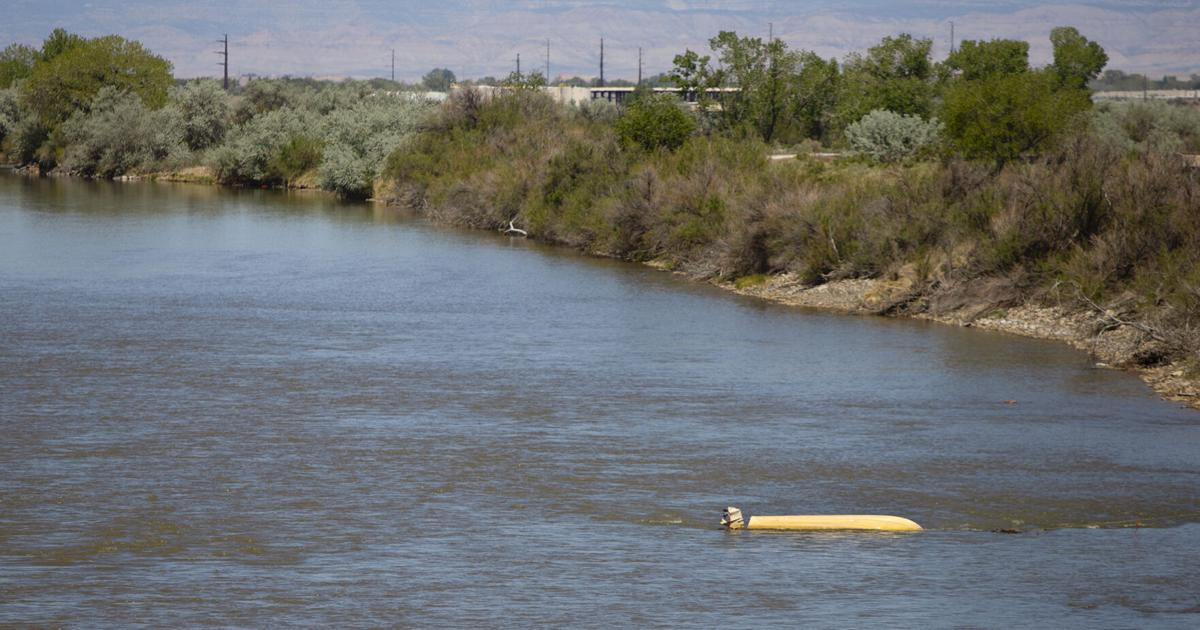 Capsized boat will stay in river for a while longer | Western Colorado ...