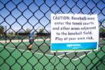 Crying foul: Tennis players seek solution to baseball fouls hitting Canyon View courts