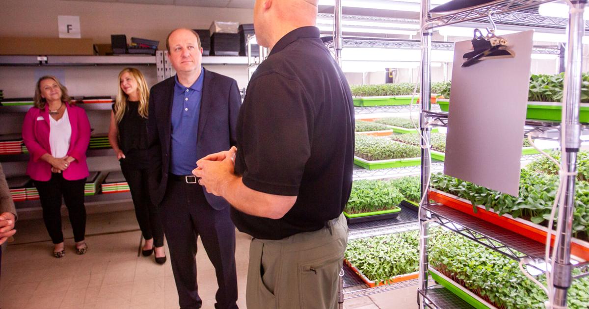 Small businesses get spotlight in Polis tour of Incubator