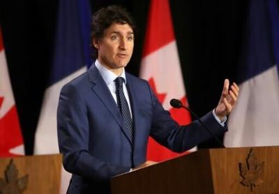 Canadian Prime Minister Justin Trudeau, seen here speaking during a joint press conference with French Prime Minister Gabriel Attal (out of frame) in Ottawa on April 11, 2024, had promised a historical normalization of undocumented migrants
