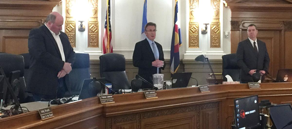 Commissioners practice social distancing