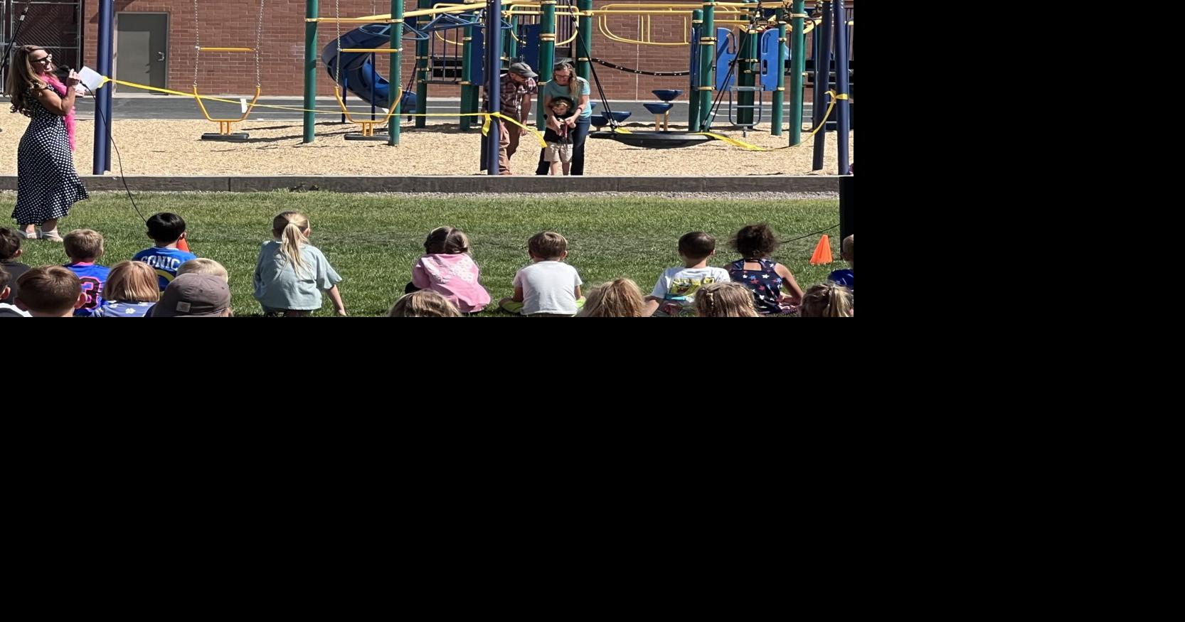Broadway Elementary cuts ribbon for new playground