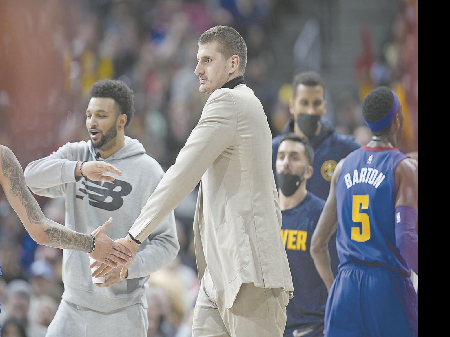 Nuggets coach Malone: 'No timeline' on Jokic's injured wrist ...