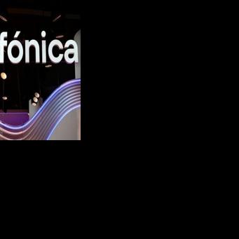 Spain's Telefonica shares drop on dividend cut, net loss