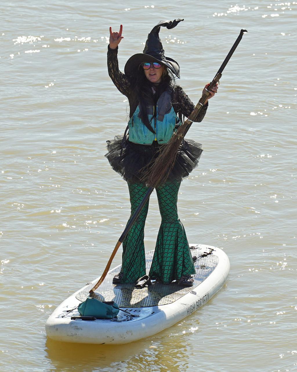 Paddle Boarders in Witch Costumes Welcome Halloween - The New York Times