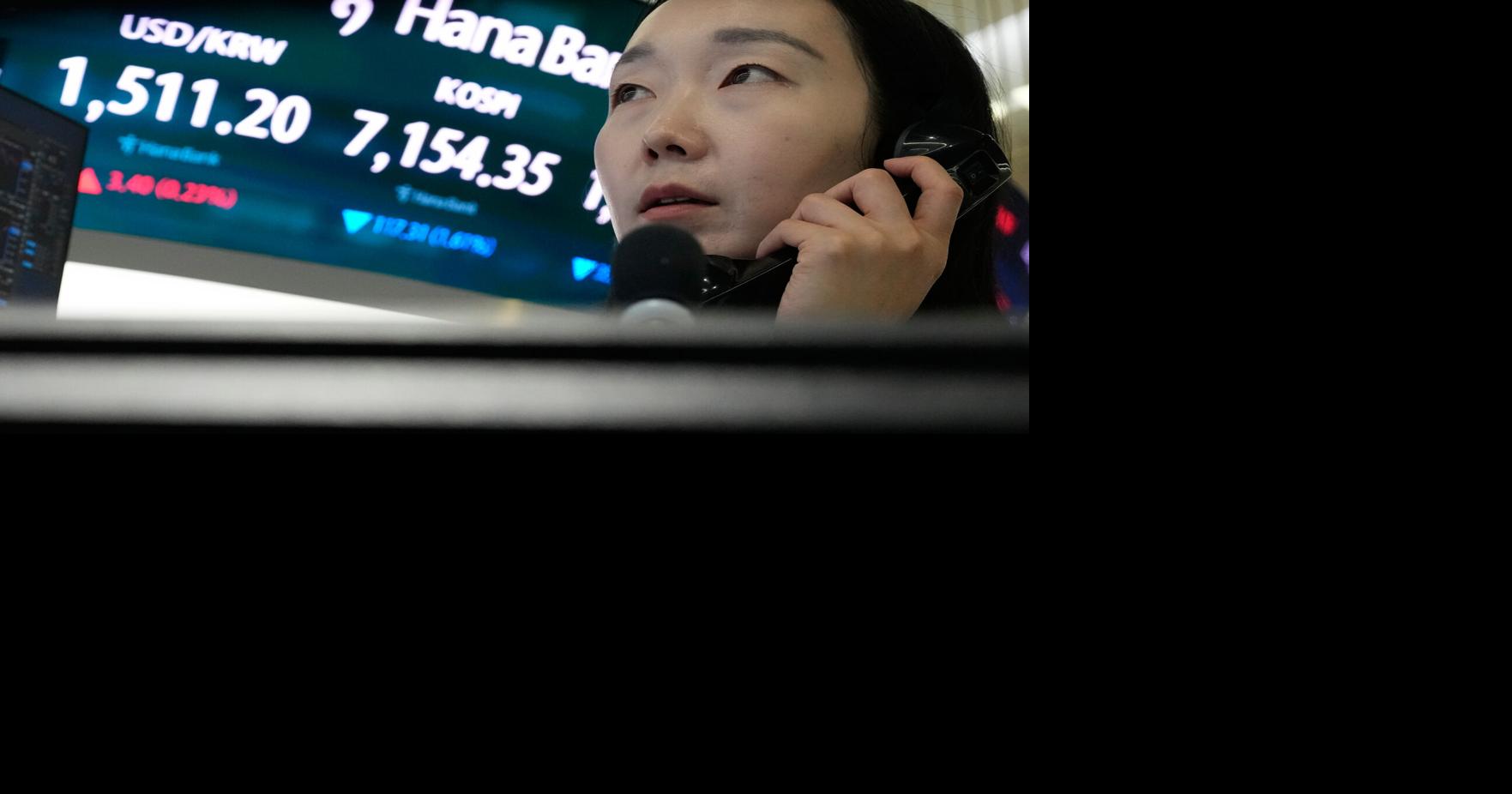Asian shares surge after oil prices slip and Wall Street resumes its AI rally