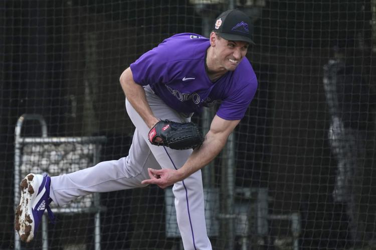 Colorado Rockies relief pitcher Brent Suter throws during a