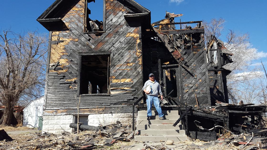 Asbestos complicates task of tearing down burnedout house Western
