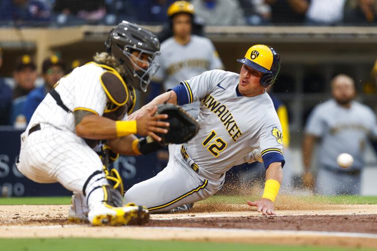 Canha's grand slam in 8th gives NL Central-leading Brewers a 9-5 victory  over Nationals