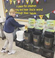 School cuts lunch waste in half through composting