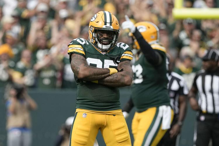 GREEN BAY, WI - JANUARY 08: Green Bay Packers linebacker Quay Walker (7)  celebrates during a game between the Green Bay Packers and the Detroit Lions  at Lambeau Field on January 8