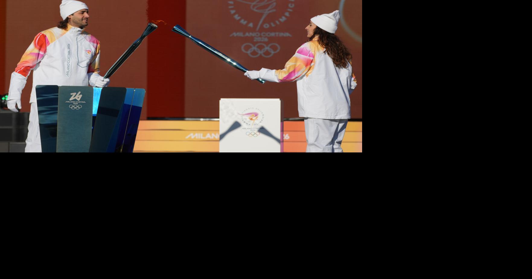 CORRECTION Italy Olympics Milan Cortina Flame